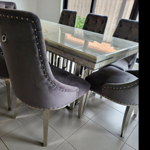 Elegant Marble Dining table with Modern Grey Velvet Dining Room Chairs in Stainless Steel Frame