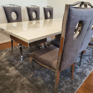 Classy Marble Dining Table With Circle Grey Velvet Style Dining Room Chairs in Silver Stainless Steel Frame