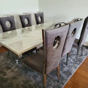 Classy Marble Dining Table With Circle Grey Velvet Style Dining Room Chairs in Silver Stainless Steel Frame. Best Dining Table at RBM Classic Home