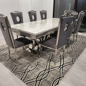 Discover Best Marble Dining Table Set. Elegant and Classy LV Marble Dining Table With Modern Grey Velvet Dining Room Chairs with Silver Stainless Steel Frame