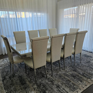 Elegant and Classy LV Marble Dining Table With Classic White Leather Dining Room Chairs in Silver Stainless Steel Frame. Best Marble Dining Tables and Chairs in Melton, Melbourne