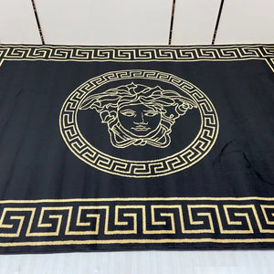 Classy Comfortable Black and Gold Carpet with Versace logo